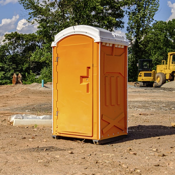 how often are the portable restrooms cleaned and serviced during a rental period in Ottosen IA